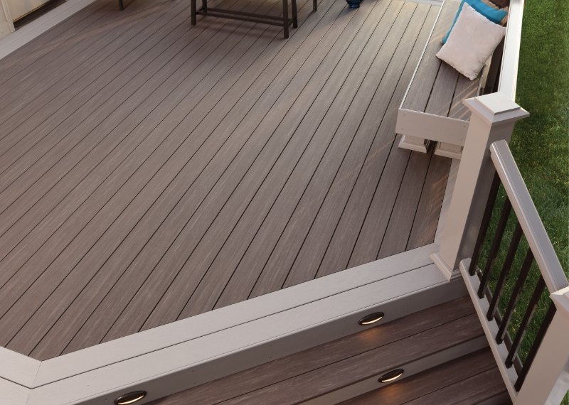 brown decking and lighted stairs